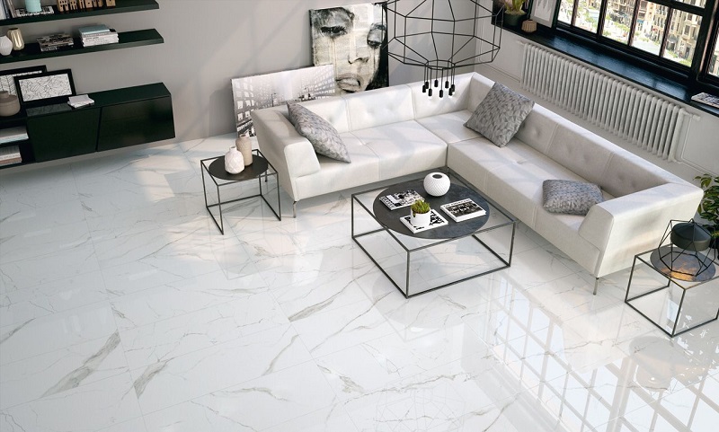 living room with white bed and marble porcelain tiles